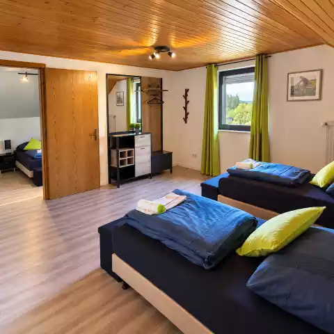 Comfortabele hotelkamer voor fietsgroepen bij Im Eifel